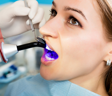 Close-up of female patient receiving cosmetic bonding