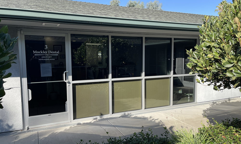 Close-up of door and window of Mockler Dental