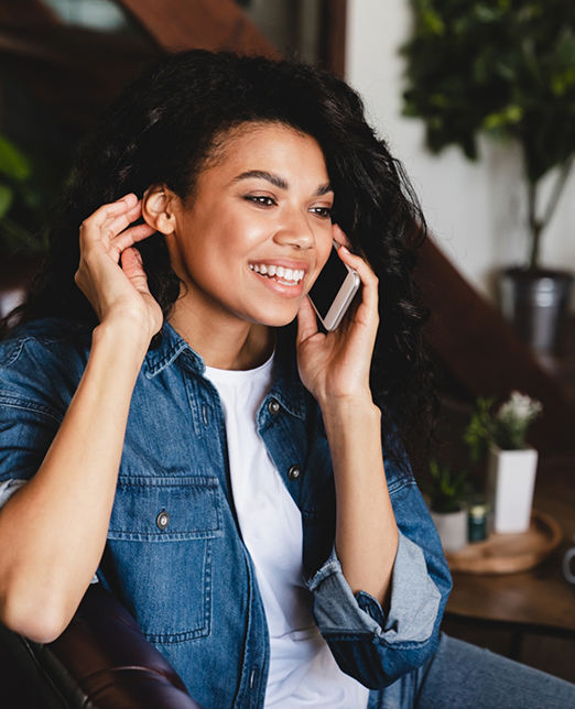 Woman talking on phone and smiling